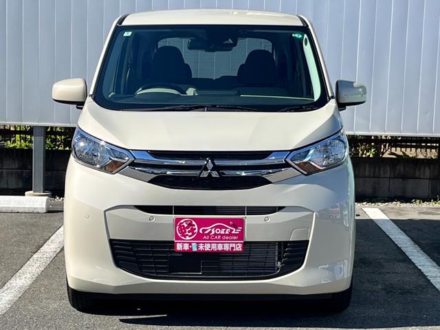 ｅＫワゴン Ｍ　バックカメラ／純正ＣＤオーディオ／オートライト／キーレス／衝突被害軽減ブレーキ／前後コーナーセンサー／ステアリングリモコン／アイドリングストップ／電動格納ミラー／シートリフター／ハロゲンヘッドライト（49枚目）