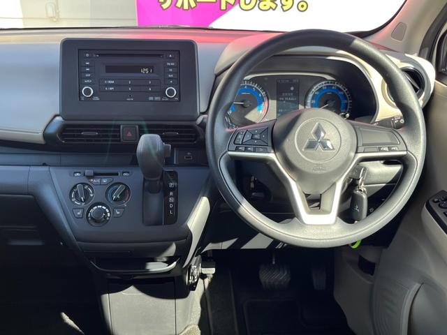 eKワゴン M バックカメラ/純正CDオーディオ/オートライト/キーレス/衝突被害軽減ブレーキ/前後コーナーセンサー/ステアリングリモコン/アイドリングストップ/電動格納ミラー/シートリフター/ハロゲンヘッドライト(4枚目)