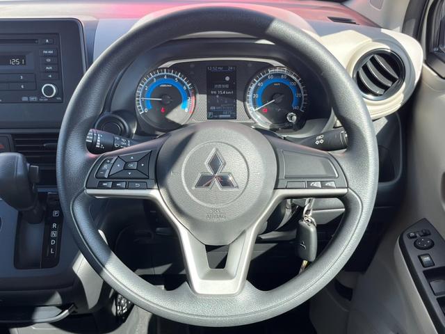 eKワゴン M バックカメラ/純正CDオーディオ/オートライト/キーレス/衝突被害軽減ブレーキ/前後コーナーセンサー/ステアリングリモコン/アイドリングストップ/電動格納ミラー/シートリフター/ハロゲンヘッドライト(8枚目)