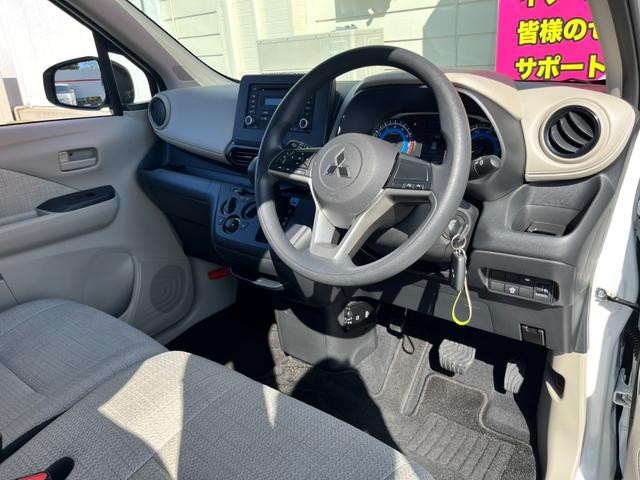 eKワゴン M バックカメラ/純正CDオーディオ/オートライト/キーレス/衝突被害軽減ブレーキ/前後コーナーセンサー/ステアリングリモコン/アイドリングストップ/電動格納ミラー/シートリフター/ハロゲンヘッドライト(24枚目)