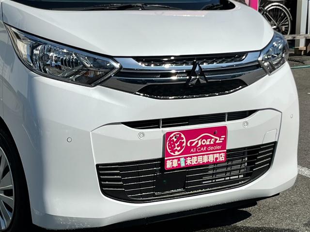 eKワゴン M バックカメラ/純正CDオーディオ/オートライト/キーレス/衝突被害軽減ブレーキ/前後コーナーセンサー/ステアリングリモコン/アイドリングストップ/電動格納ミラー/シートリフター/ハロゲンヘッドライト(40枚目)