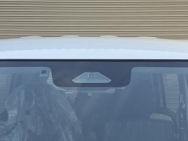 ソリオ ハイブリッドＭＸ　登録済み未使用車／ＥＴＣ２．０／電動スライドドア／衝突被害軽減ブレーキ／レーダークルーズコントロール／前席シートヒーター／後席ロールサンシェード／格納式テーブル／純正１５インチアルミホイール／ＡＨＢ（26枚目）