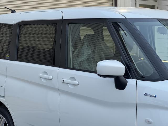 ソリオ ハイブリッドＭＸ　登録済み未使用車／ＥＴＣ２．０／電動スライドドア／衝突被害軽減ブレーキ／レーダークルーズコントロール／前席シートヒーター／後席ロールサンシェード／格納式テーブル／純正１５インチアルミホイール／ＡＨＢ（27枚目）