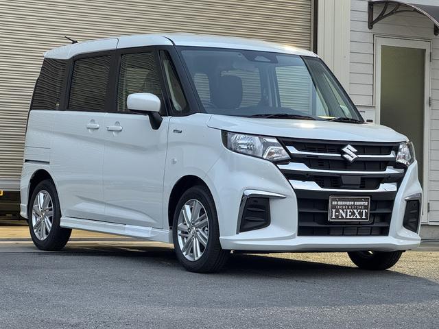 ソリオ ハイブリッドＭＸ　登録済み未使用車／ＥＴＣ２．０／電動スライドドア／衝突被害軽減ブレーキ／レーダークルーズコントロール／前席シートヒーター／後席ロールサンシェード／格納式テーブル／純正１５インチアルミホイール／ＡＨＢ（30枚目）