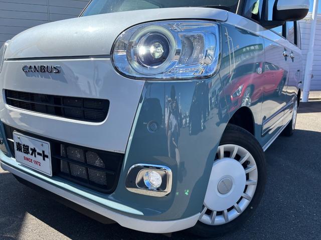 ムーヴキャンバス ストライプスＧ　雹害車につき現車確認した方のみ販売可　７インチナビ　バックカメラ　コーナーセンサー　前席シートヒーター　スマアシ　ステアリングスイッチ　ＤＶＤ再生　両側電動スライド　ホッとカップホルダー（33枚目）