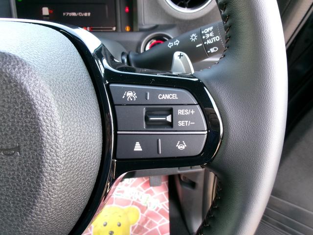 Ｎ－ＢＯＸカスタム ターボ　ホンダセンシング　ナビ装着用スペシャルパッケージ　四輪駆動　両側パワースライドドア　電動パーキング・ホールド機能　前席シートヒーター　電動格納ミラー　ロールサンシェード　シートバックテーブル（6枚目）