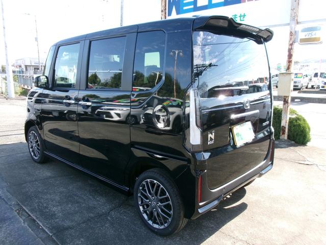 Ｎ－ＢＯＸカスタム ターボ　ホンダセンシング　ナビ装着用スペシャルパッケージ　四輪駆動　両側パワースライドドア　電動パーキング・ホールド機能　前席シートヒーター　電動格納ミラー　ロールサンシェード　シートバックテーブル（26枚目）