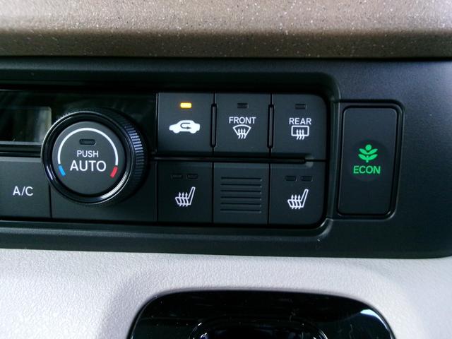 Ｎ－ＢＯＸ ファッションスタイル　ホンダセンシング　ナビ装着用スペシャルパッケージ　２トーン　両側パワースライドドア　ロールサンシェード　シートバックテーブル　左右独立リアセンターアームレスト　前席シートヒーター　プッシュスタート（3枚目）