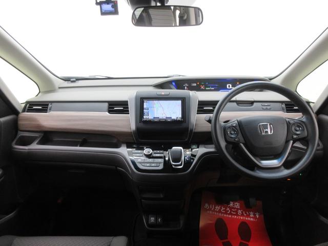 フリード+ハイブリッド ハイブリッドG・ホンダセンシング ホンダセンシング 両側電動スライドドア 5人乗り 社外ナビ ブルートゥース バックカメラ ドラレコ 左右シートヒーター クルーズコントロール ステアリングリモコン LEDヘッドライト デアイサー(10枚目)