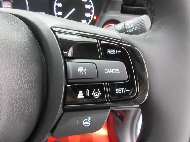 �n���h�����������܂܃I�[�f�B�I�̑��삪�o����X�e�A�����O�X�C�b�`�t����