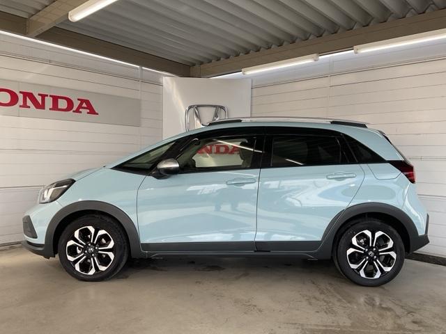 フィット e:HEVクロスター ワンオーナー 前後純正ドラレコ装着車 衝突回避システム 禁煙 1オーナー フルオートエアコン 整備記録簿 前後センサー LEDランプ エアバッグ サイドエアバック 地デジ オートクルーズコントロール(5枚目)