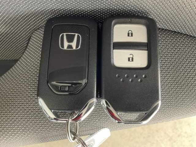 フィット e:HEVクロスター ワンオーナー 前後純正ドラレコ装着車 衝突回避システム 禁煙 1オーナー フルオートエアコン 整備記録簿 前後センサー LEDランプ エアバッグ サイドエアバック 地デジ オートクルーズコントロール(49枚目)