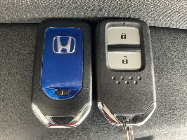 ヴェゼル ハイブリッドX・ホンダセンシング ワンオーナー 前後純正ドラレコ装着車 禁煙 1オナ 地デジ Aクルーズ Bモニ スマキー オートエアコン VSA LEDヘッドライト ETC車載器 カーテンエアバッグ ドライブレコーダー装着車 ABS(49枚目)