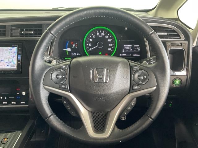 シャトル ハイブリッドXホンダセンシング ワンオーナー フロント純正ドラレコ装着車 4WD 衝突軽減装置 ドライブレコーダ Rカメラ Fセグ LEDヘッド 禁煙車 ECON AAC 盗難防止装置 ETC車載器 記録簿 DVD再生 スマートキー(14枚目)