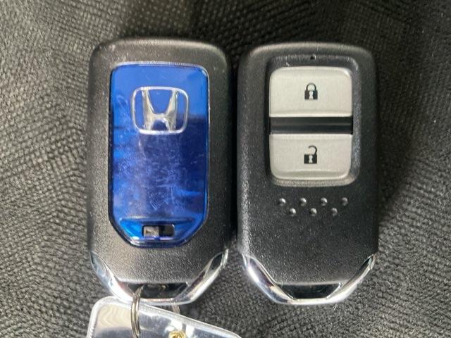 シャトル ハイブリッドXホンダセンシング ワンオーナー フロント純正ドラレコ装着車 4WD 衝突軽減装置 ドライブレコーダ Rカメラ Fセグ LEDヘッド 禁煙車 ECON AAC 盗難防止装置 ETC車載器 記録簿 DVD再生 スマートキー(49枚目)