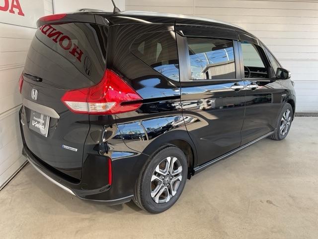 フリードハイブリッド ハイブリッド・クロスターホンダセンシング ワンオーナー 前後純正ドラレコ装着車 両側Pスライドドア オートクルーズコントロール 禁煙 記録簿 ワンオ-ナ- DVD再生可能 LEDライト ABS 盗難防止 シ-トヒ-タ- スマ-トキ- VSA(8枚目)