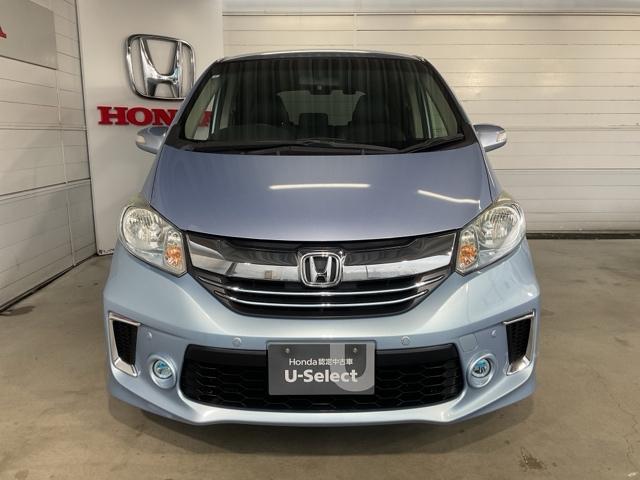 フリードハイブリッド ジャストセレクション　ワンオーナー　純正リア席ミニター　両側電動スライドドア　ナビテレビ　セキュリティー　禁煙　横滑り防止機能　記録簿　オートクルーズ　地デジ　エアバック　クリアランスソナー　ベンチシート　ウォークスルー（3枚目）