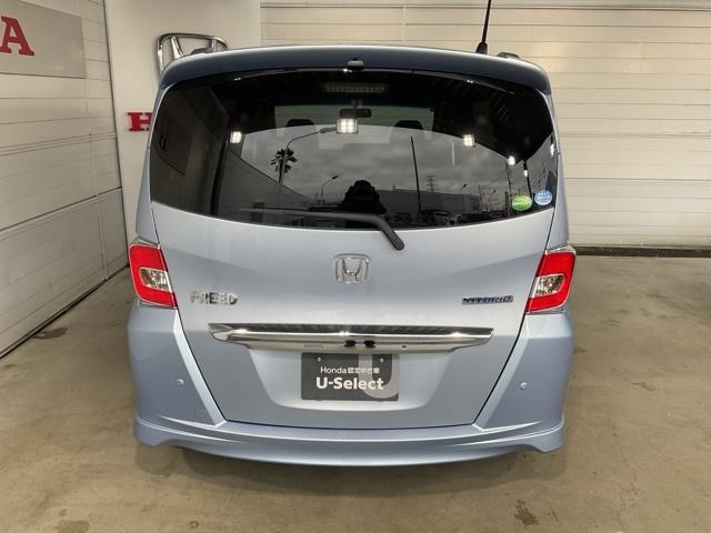 フリードハイブリッド ジャストセレクション　ワンオーナー　純正リア席ミニター　両側電動スライドドア　ナビテレビ　セキュリティー　禁煙　横滑り防止機能　記録簿　オートクルーズ　地デジ　エアバック　クリアランスソナー　ベンチシート　ウォークスルー（7枚目）