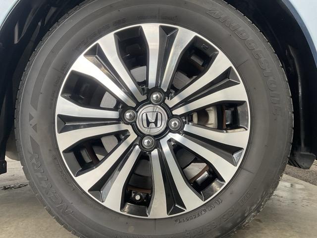 フリードハイブリッド ジャストセレクション　ワンオーナー　純正リア席ミニター　両側電動スライドドア　ナビテレビ　セキュリティー　禁煙　横滑り防止機能　記録簿　オートクルーズ　地デジ　エアバック　クリアランスソナー　ベンチシート　ウォークスルー（41枚目）