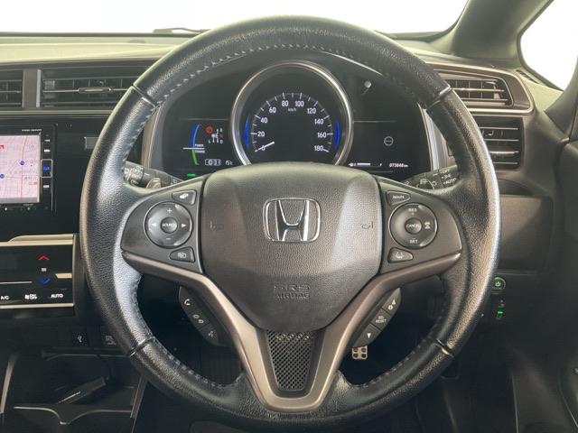 フィットハイブリッド Ｓホンダセンシング　ワンオーナー　スマ－トキ－　ナビＴＶ　禁煙　アクティブクルーズコントロール　パワーウインドウ　サイドエアバック　ＤＶＤ再生　パワーステアリング　整備記録簿　ＬＥＤヘッドランプ　ＡＢＳ　盗難防止装置（14枚目）