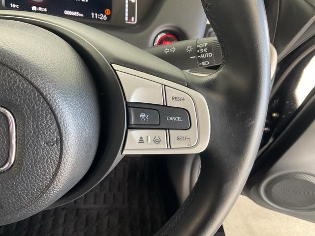 フィット ｅ：ＨＥＶホーム　当社デモカー　前後純正ドラレコ装着車　前後誤発進抑制機能　クリソナ　助手席エアバッグ　運転席エアバッグ　１オナ　アイドリングストップ　禁煙　ＬＥＤライト　バックカメラ　ＡＢＳ　サイドエアバッグ　ＶＳＡ（47枚目）