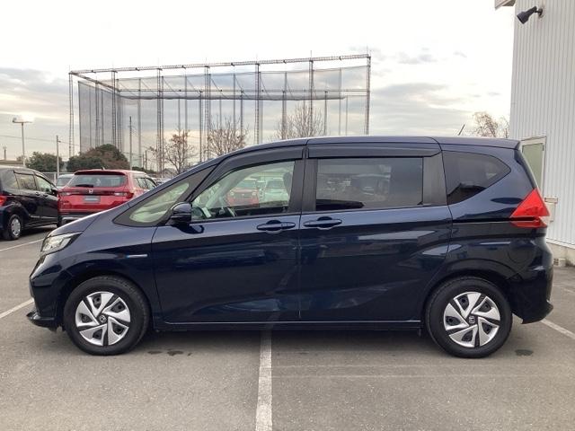 フリードハイブリッド ハイブリッド・Ｇホンダセンシング　ワンオーナー　前後純正ドラレコ装着車　軽減ブレーキ　キーフリーシステム　１オ－ナ－　記録簿　ＤＶＤ再生可能　ＥＣＯＮ　禁煙　後カメラ　Ａクルーズ　地デジフルセグＴＶ　ＬＥＤヘッドランプ　シートＨ（5枚目）