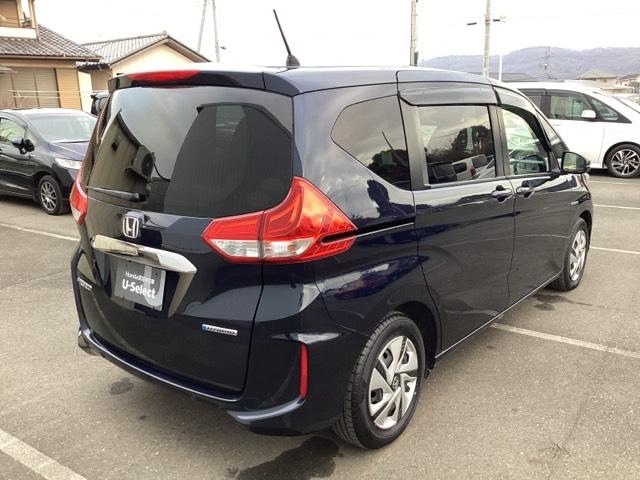 フリードハイブリッド ハイブリッド・Ｇホンダセンシング　ワンオーナー　前後純正ドラレコ装着車　軽減ブレーキ　キーフリーシステム　１オ－ナ－　記録簿　ＤＶＤ再生可能　ＥＣＯＮ　禁煙　後カメラ　Ａクルーズ　地デジフルセグＴＶ　ＬＥＤヘッドランプ　シートＨ（8枚目）