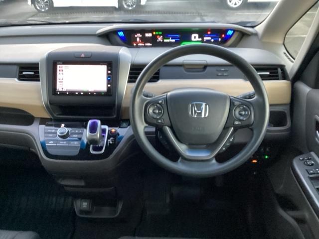 フリードハイブリッド ハイブリッド・Ｇホンダセンシング　前後純正ドラレコ装着車　軽減ブレーキ　キーフリーシステム　１オ－ナ－　記録簿　ＤＶＤ再生可能　ＥＣＯＮ　禁煙　後カメラ　Ａクルーズ　地デジフルセグＴＶ　ＬＥＤヘッドランプ　横滑防止　ドライブレコーダ（13枚目）