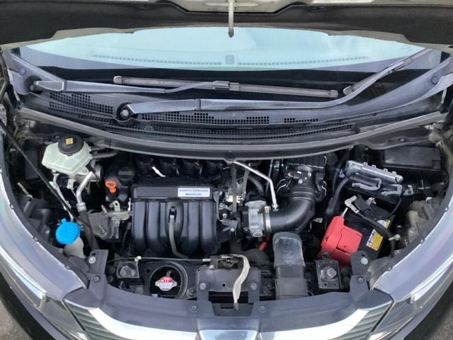 フリードハイブリッド ハイブリッド・Ｇホンダセンシング　前後純正ドラレコ装着車　軽減ブレーキ　キーフリーシステム　１オ－ナ－　記録簿　ＤＶＤ再生可能　ＥＣＯＮ　禁煙　後カメラ　Ａクルーズ　地デジフルセグＴＶ　ＬＥＤヘッドランプ　横滑防止　ドライブレコーダ（24枚目）