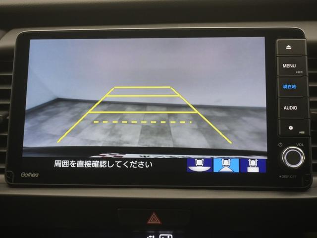 フィット ｅ：ＨＥＶホームブラックスタイル　当社デモカー９インチプレミアムインターナビ　バックカメラ　ホンダセンシング　ＬＥＤオートライト　パーキングソナー　Ｂカメラ　ＤＶＤ再生　アイドリングストップ　オートクルーズコントロール　ＥＴＣ　４ＷＤ（18枚目）