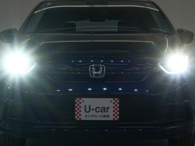 フィット ｅ：ＨＥＶホームブラックスタイル　当社デモカー９インチプレミアムインターナビ　バックカメラ　ホンダセンシング　ＬＥＤオートライト　パーキングソナー　Ｂカメラ　ＤＶＤ再生　アイドリングストップ　オートクルーズコントロール　ＥＴＣ　４ＷＤ（29枚目）