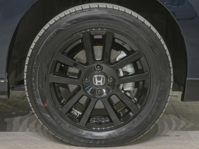 フィット ｅ：ＨＥＶホームブラックスタイル　当社デモカー９インチプレミアムインターナビ　バックカメラ　ホンダセンシング　ＬＥＤオートライト　パーキングソナー　Ｂカメラ　ＤＶＤ再生　アイドリングストップ　オートクルーズコントロール　ＥＴＣ　４ＷＤ（30枚目）