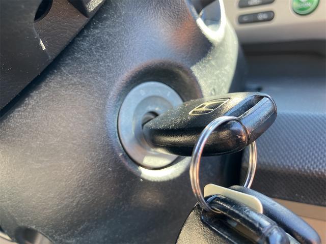 フリード G ジャストセレクション ETC バックカメラ ナビ TV 両側スライド・片側電動 オートライト HID キーレスエントリー 電動格納ミラー 3列シート ウォークスルー CVT 衝突安全ボディ ABS エアコン(11枚目)