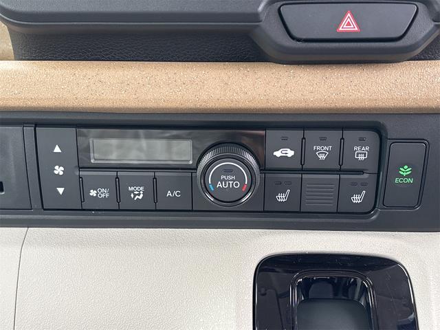 Ｎ－ＢＯＸ ファッションスタイル　バックカメラ　両側電動スライドドア　クリアランスソナー　レーンアシスト　オートライト　スマートキー　アイドリングストップ　電動格納ミラー　シートヒーター　ＣＶＴ　ＥＳＣ　エアコン　パワーウィンドウ（11枚目）