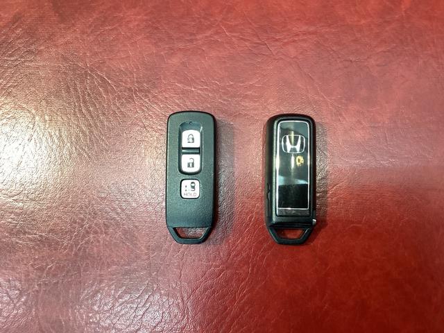 N-BOXカスタム G・Lホンダセンシング 地デジTV 助手席エアバッグ キーレス シートH アイドリングST スマ-トキ- リアカメラ ナビTV ETC 前車追従機能 サイドエアバッグ LEDヘッドライト USB(39枚目)