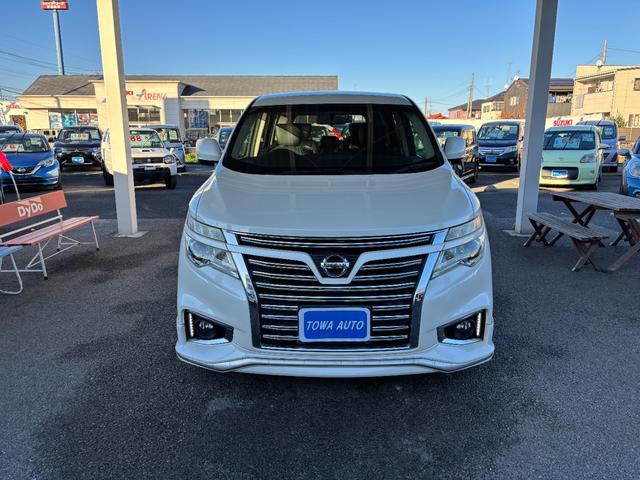 エルグランド ２５０ハイウェイスター　後期型　純正ナビ　フルセグ　走行中ＴＶ視聴可　バックカメラ　純正フリップダウンモニター　両側電動スライドドア　ハーフレザーシート　フロントスポイラーデイライト　オットマン　ドライブレコーダー前後（3枚目）