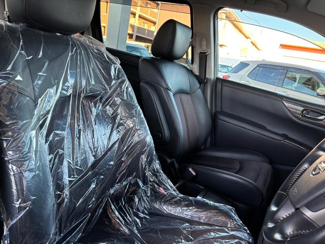 エルグランド ２５０ハイウェイスター　後期型　純正ナビ　フルセグ　走行中ＴＶ視聴可　バックカメラ　純正フリップダウンモニター　両側電動スライドドア　ハーフレザーシート　フロントスポイラーデイライト　オットマン　ドライブレコーダー前後（13枚目）