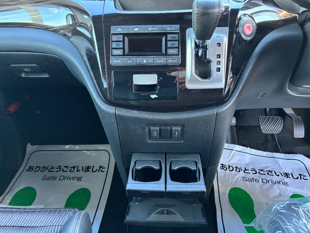 エルグランド ２５０ハイウェイスター　後期型　純正ナビ　フルセグ　走行中ＴＶ視聴可　バックカメラ　純正フリップダウンモニター　両側電動スライドドア　ハーフレザーシート　フロントスポイラーデイライト　オットマン　ドライブレコーダー前後（22枚目）