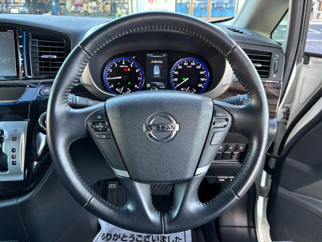 エルグランド ２５０ハイウェイスター　後期型　純正ナビ　フルセグ　走行中ＴＶ視聴可　バックカメラ　純正フリップダウンモニター　両側電動スライドドア　ハーフレザーシート　フロントスポイラーデイライト　オットマン　ドライブレコーダー前後（23枚目）