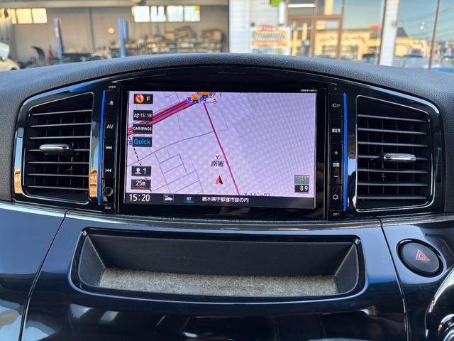 エルグランド ２５０ハイウェイスター　後期型　純正ナビ　フルセグ　走行中ＴＶ視聴可　バックカメラ　純正フリップダウンモニター　両側電動スライドドア　ハーフレザーシート　フロントスポイラーデイライト　オットマン　ドライブレコーダー前後（26枚目）