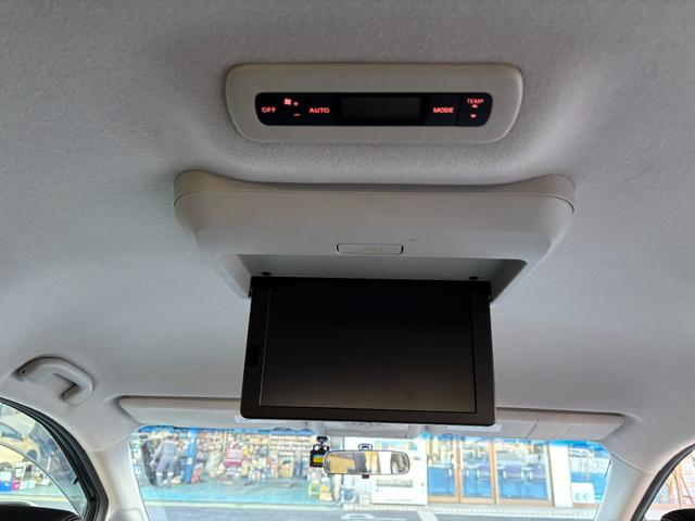 エルグランド ２５０ハイウェイスター　後期型　純正ナビ　フルセグ　走行中ＴＶ視聴可　バックカメラ　純正フリップダウンモニター　両側電動スライドドア　ハーフレザーシート　フロントスポイラーデイライト　オットマン　ドライブレコーダー前後（29枚目）