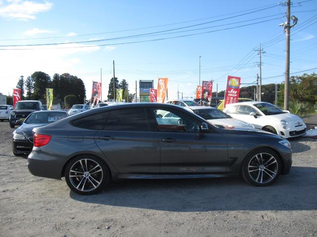 3シリーズ 320iグランツーリスモ Mスポーツ 修復歴無し 走行5万キロ台 純正iドライブナビ パドルシフト付き バックモニター+パークディスタンス コンフォートアクセス 19インチアルミ 車両取説・メンテナンスノート・整備記録簿付き(5枚目)