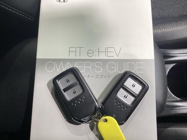 フィット ｅ：ＨＥＶホーム　当社デモカー・Ｂｌｕｅｔｏｏｔｈ・純正ナビ・リアカメラ・ＥＴＣ２．０・前後ドラレコ・・禁煙車・ワンオーナー・ＶＳＡ・サイドカーテンエアバック・電子パーキング・ブレーキホールド・ドアバイザー・スペアキー（26枚目）