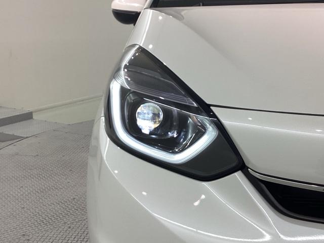 フィット ｅ：ＨＥＶホーム　当社デモカー・Ｂｌｕｅｔｏｏｔｈ・純正ナビ・リアカメラ・ＥＴＣ２．０・前後ドラレコ・・禁煙車・ワンオーナー・ＶＳＡ・サイドカーテンエアバック・電子パーキング・ブレーキホールド・ドアバイザー・スペアキー（30枚目）