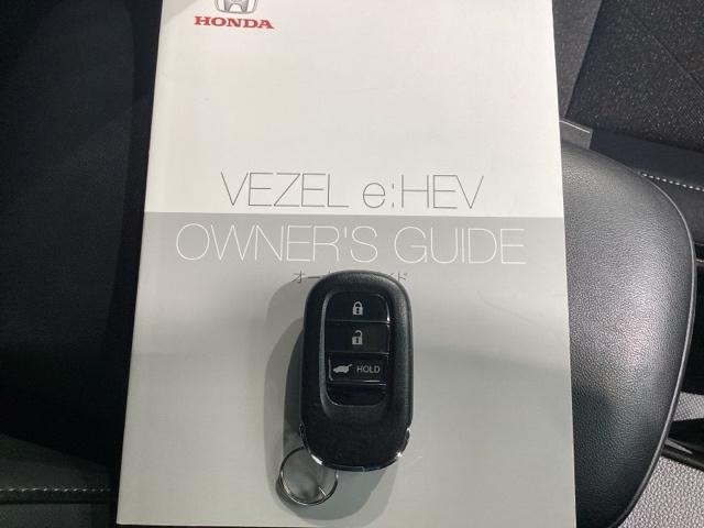 ヴェゼル e:HEVZ Bluetooth・純正ナビ・リアカメラ・ETC・前後ドラレコ・禁煙車・ワンオーナー・VSA・サイドカーテンエアバック・電子パーキング・ブレーキホールド・シートヒーター・パワーテールゲート・取扱説明書(29枚目)