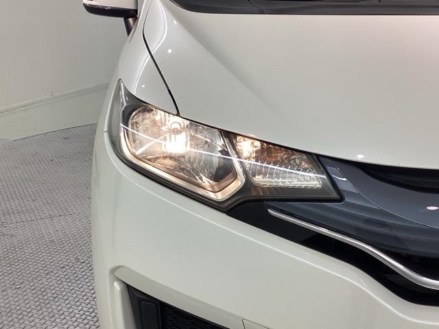 フィット 13G・Fパッケージ Bluetooth・純正ナビ・リアカメラ・ETC・ドラレコ・禁煙車・ワンオーナー・VSA・SRSエアバック・オートA/C・スマートキー・オートリトラミラー・ドアバイザー・取扱説明書・記録簿・スペアキー(28枚目)