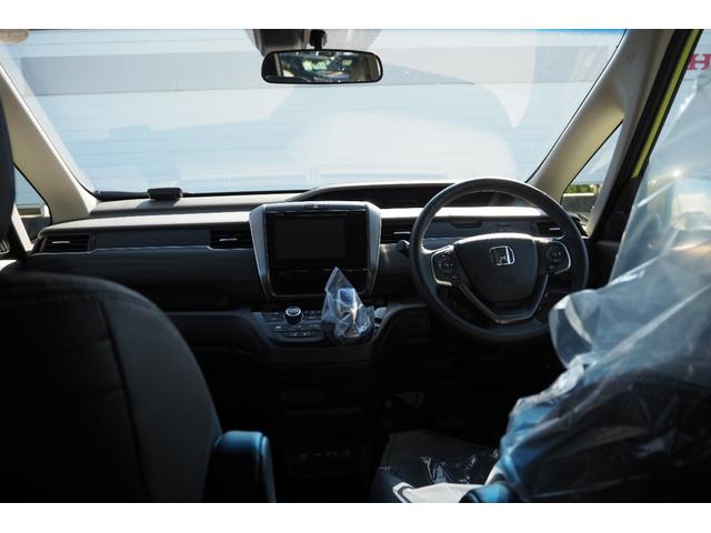 フリードハイブリッド ハイブリッド・ＥＸ　ホンダセンシング／衝突軽減ブレーキ／クルーズコントロール／両側パワースライドドア／ＬＥＤヘッドライト／アルミホイール／純正ナビ／ＴＶ（ワンセグ）／バックカメラ／アップルカープレイ／（2枚目）