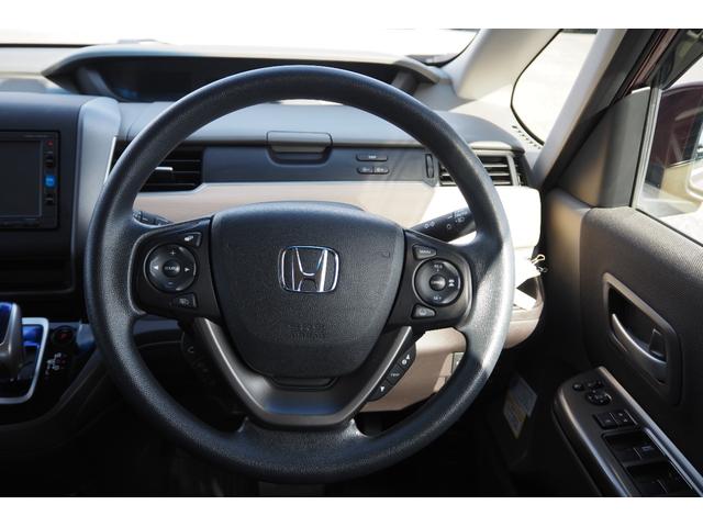 フリードハイブリッド ハイブリッド・Gホンダセンシング ドラレコ(前)/衝突軽減ブレーキ/クルーズコントロール/両側パワースライドドア/ETC/TV(ワンセグ)/バックカメラ/純正ナビ/LEDヘッドライト/(11枚目)