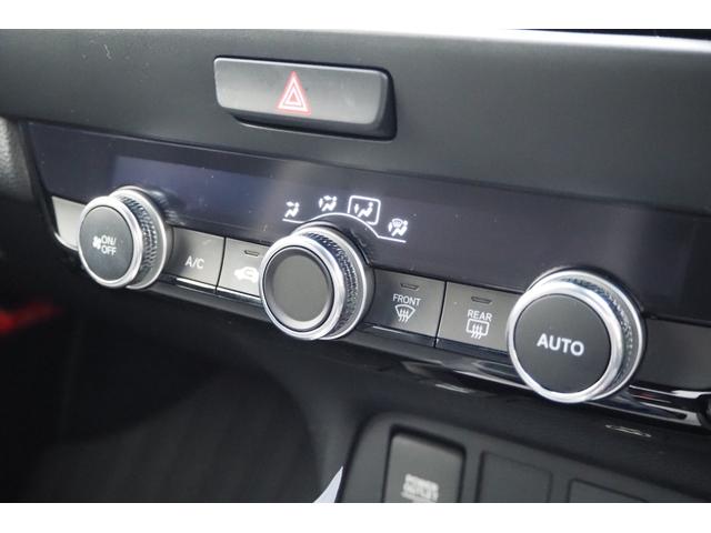 フィット ｅ：ＨＥＶクロスター　ホンダセンシング／衝突軽減ブレーキ／クルーズコントロール／ＬＥＤヘッドライト／１６インチアルミホイール／純正ナビ／ＥＴＣ／ＴＶ／バックカメラ／サイドカーテンエアバック／ＣＤ／ＤＶＤ／（16枚目）