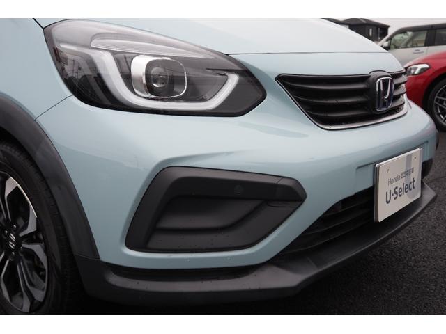 フィット ｅ：ＨＥＶクロスター　ホンダセンシング／衝突軽減ブレーキ／クルーズコントロール／ＬＥＤヘッドライト／１６インチアルミホイール／純正ナビ／ＥＴＣ／ＴＶ／バックカメラ／サイドカーテンエアバック／ＣＤ／ＤＶＤ／（48枚目）